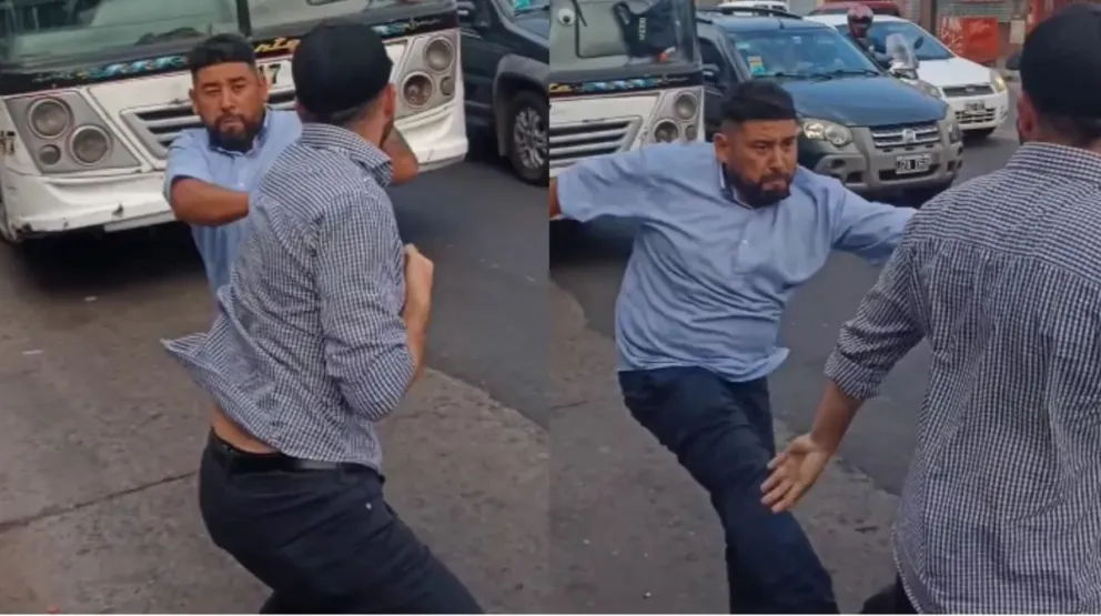 Un chofer de colectivo a las piñas con un conductor 
