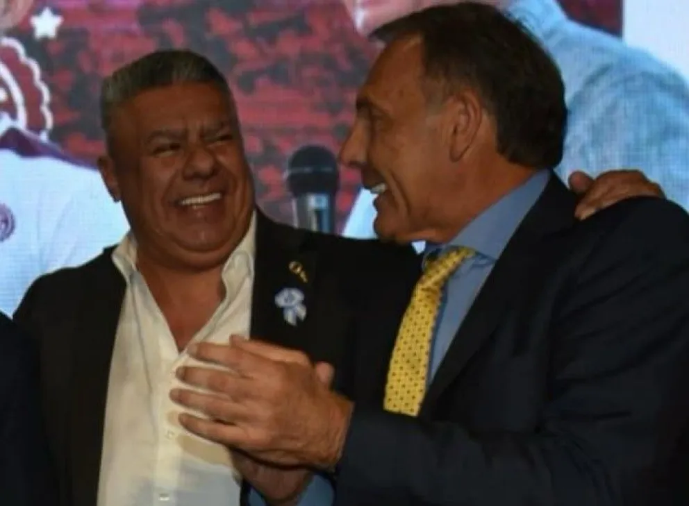 Claudio Tapia y Miguel Russo.