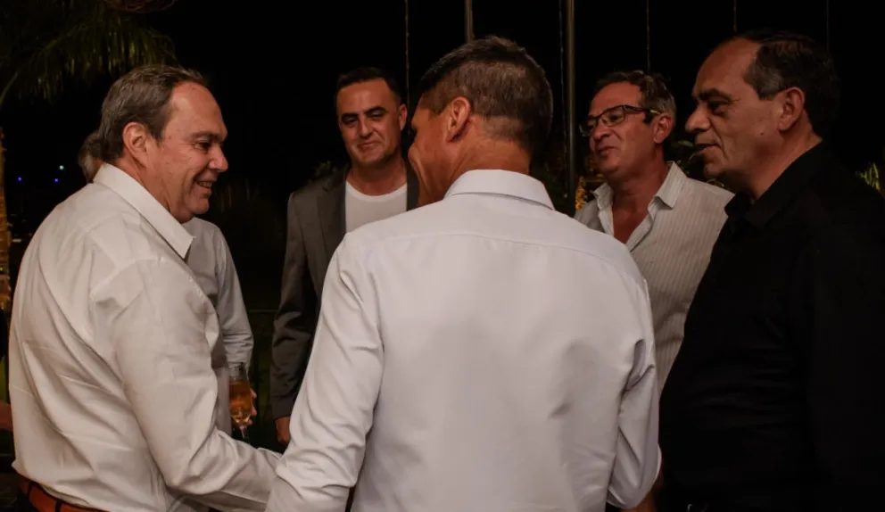 Decisión. Baigorrí, a la izquierda, con Rolando Lozano, Fernando Rahmé y Federico Osollo, en la cena de fin de año de Confias. El flamante fiscal General prescindió de sus servicios.