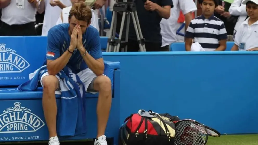 Mardy Fish se retiró horas antes de enfrentar a Federer por un episodio de ansiedad. 