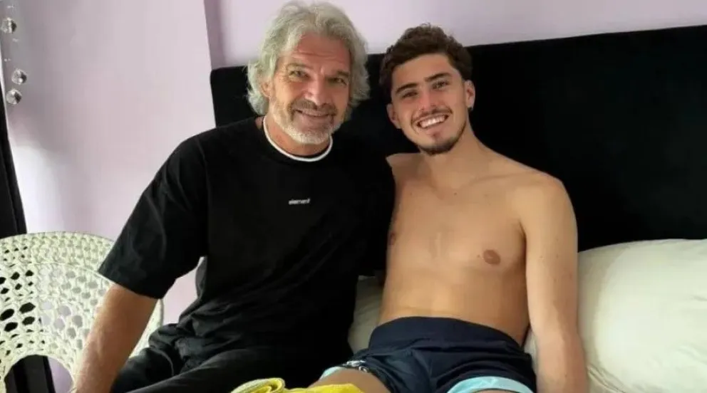 Joaquín Panichelli, junto a su papá, Germán.