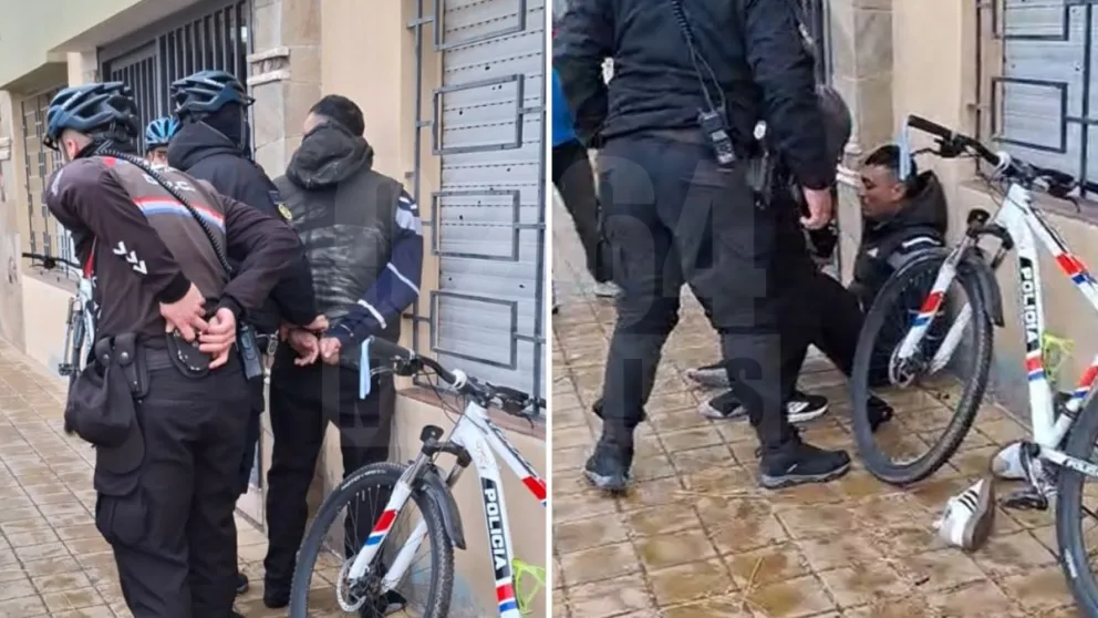 El malviviente, de apellido Guzmán, siendo esposado por policías.