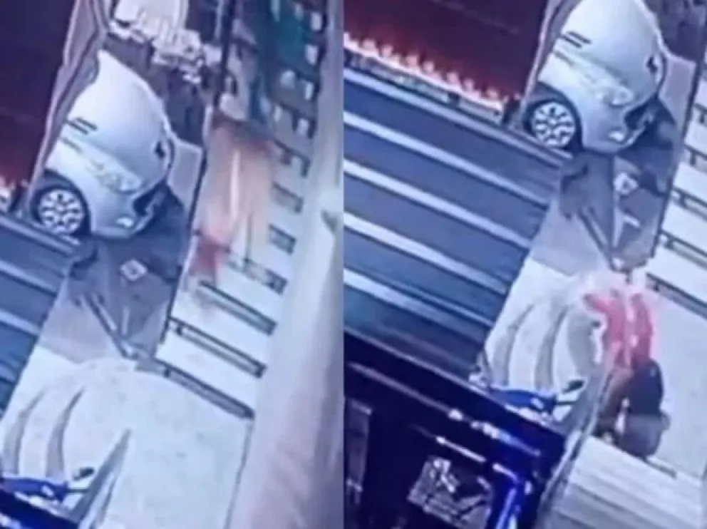 Imagenes del momento en el que el hombre tiró por las escaleras a la mujer embarazada. 
