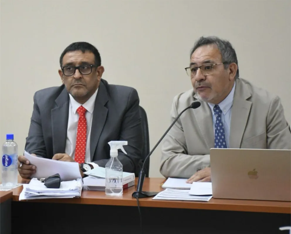 Los abogados Marcelo Sandez y Néstor "Roly" Olivera representan legalmente a Laura Naranjo y su marido.